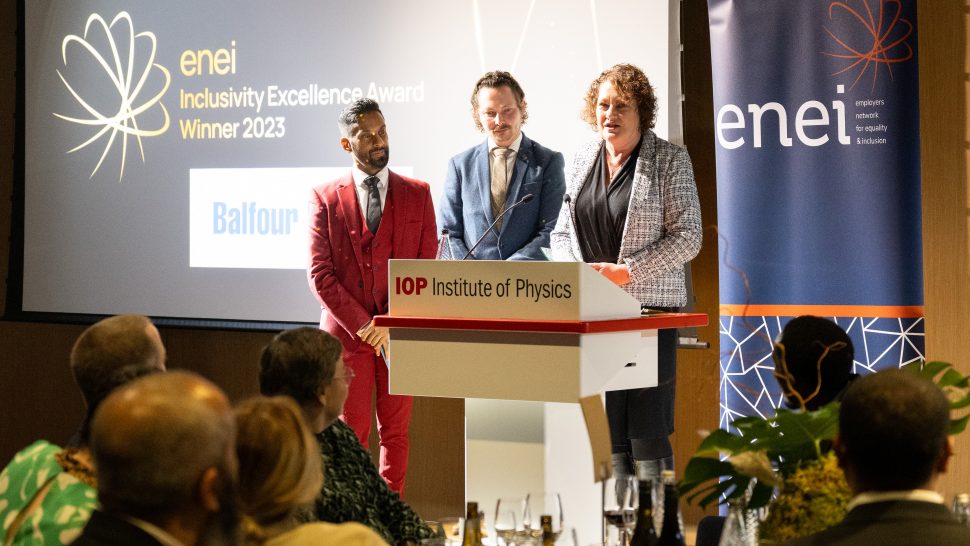 Representative from Balfour Beatty accepting an award and deliver a short speech at the podium