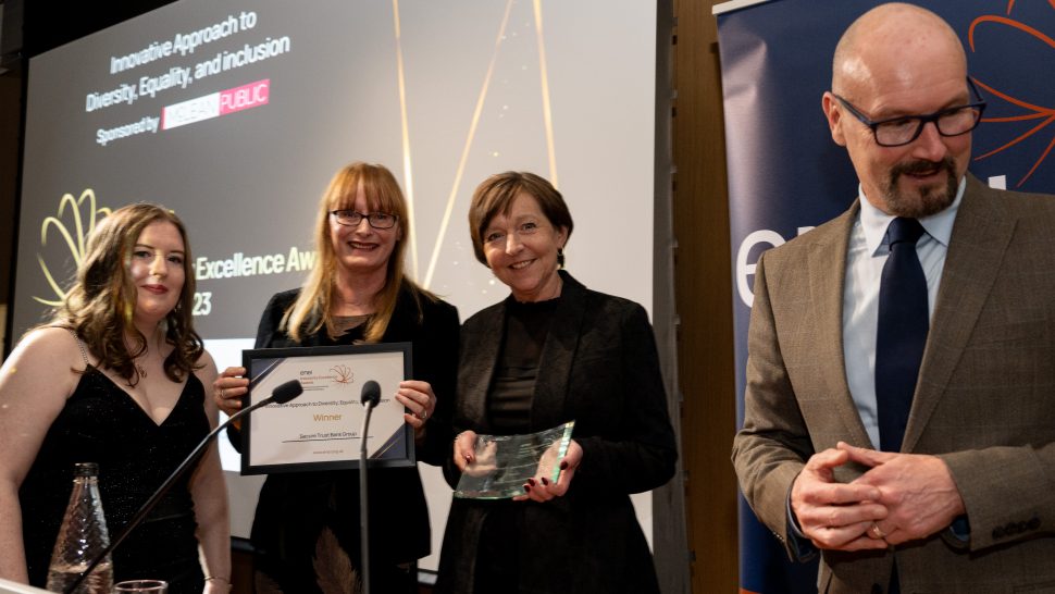 Secure Trust representatives receiving their award at the ceremony