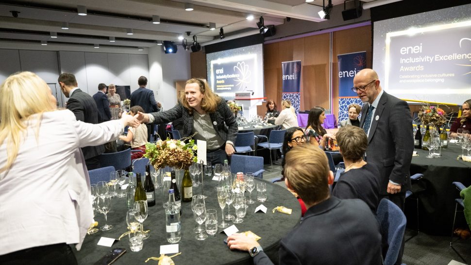 The award winners introducing themselves to others seated at the same table at the beginning of the awards ceremony.