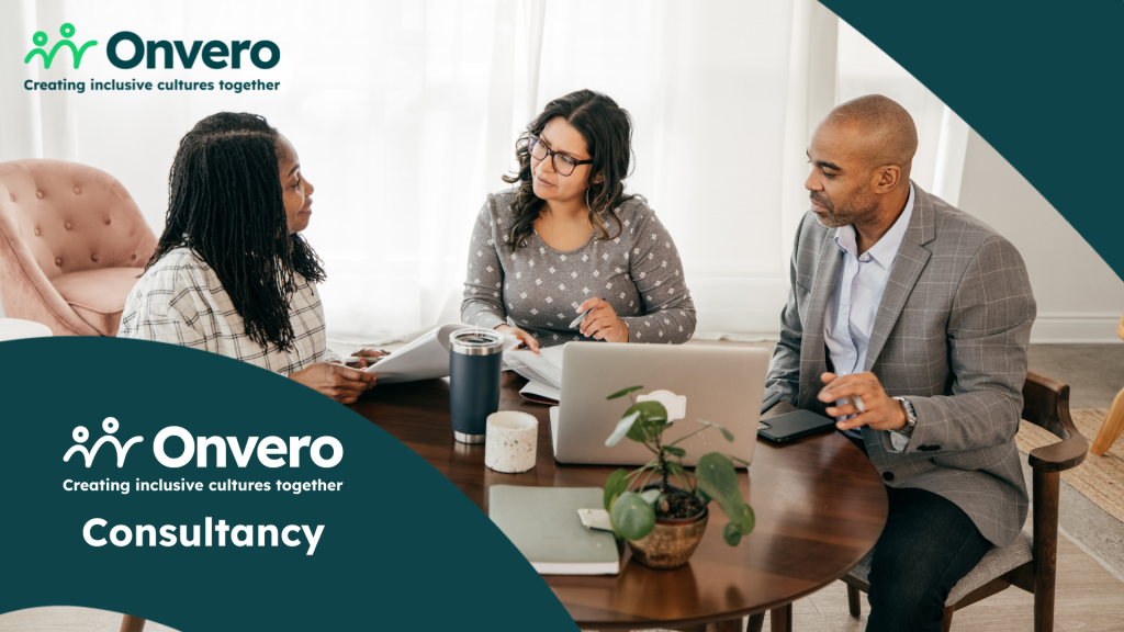 The image shows three diverse individuals seated around a table in an office setting, engaged in a discussion. The Onvero logo is in the corner alongside the text "Consultancy".